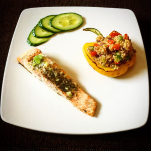 Salmon with mixed peppers quinoa stuffed yellow pepper